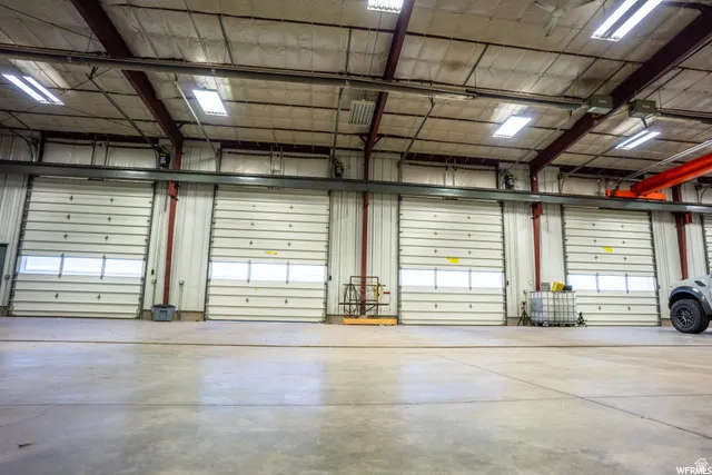 Multiple industrial roll-up doors with integrated windows