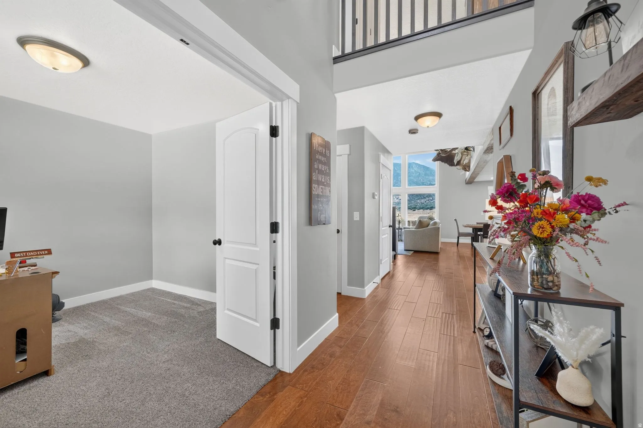 Wood-finish flooring throughout the main hallway