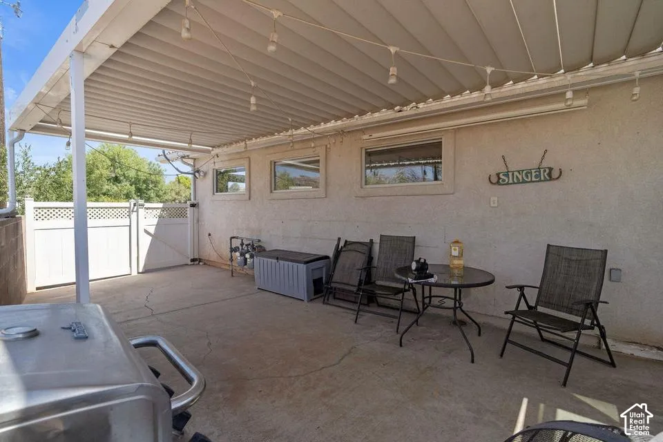 Covered patio with concrete flooring