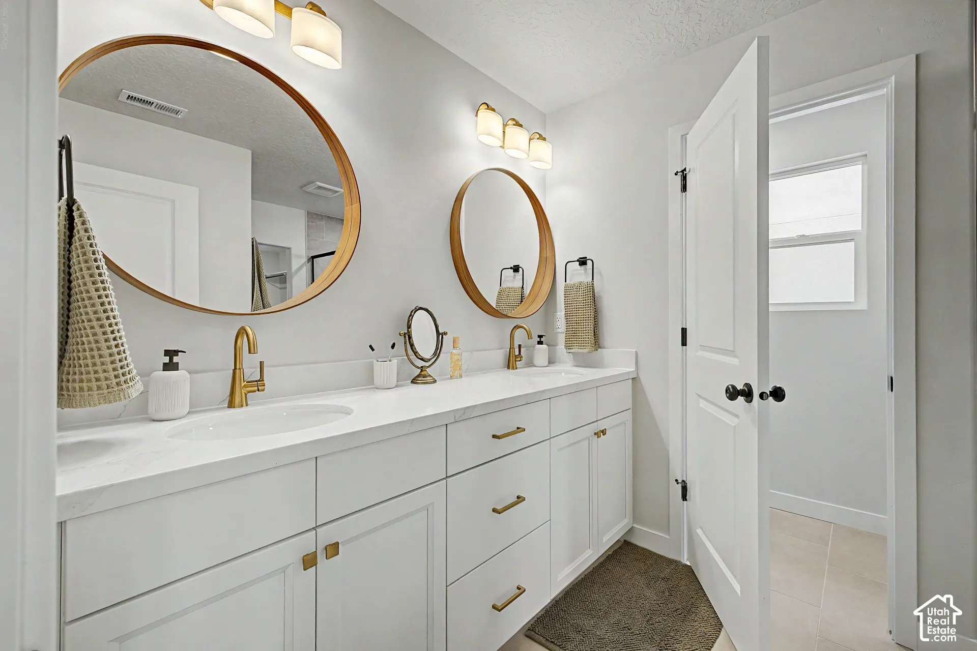 Dual round mirrors with wood-finish frames