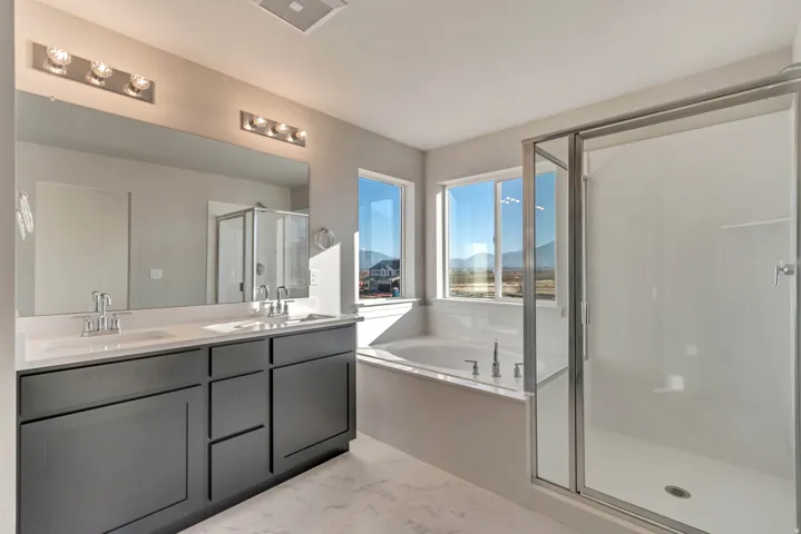 Primary Bathroom. *Not actual home. Buyer will choose their own cabinets, counters, and fixtures.