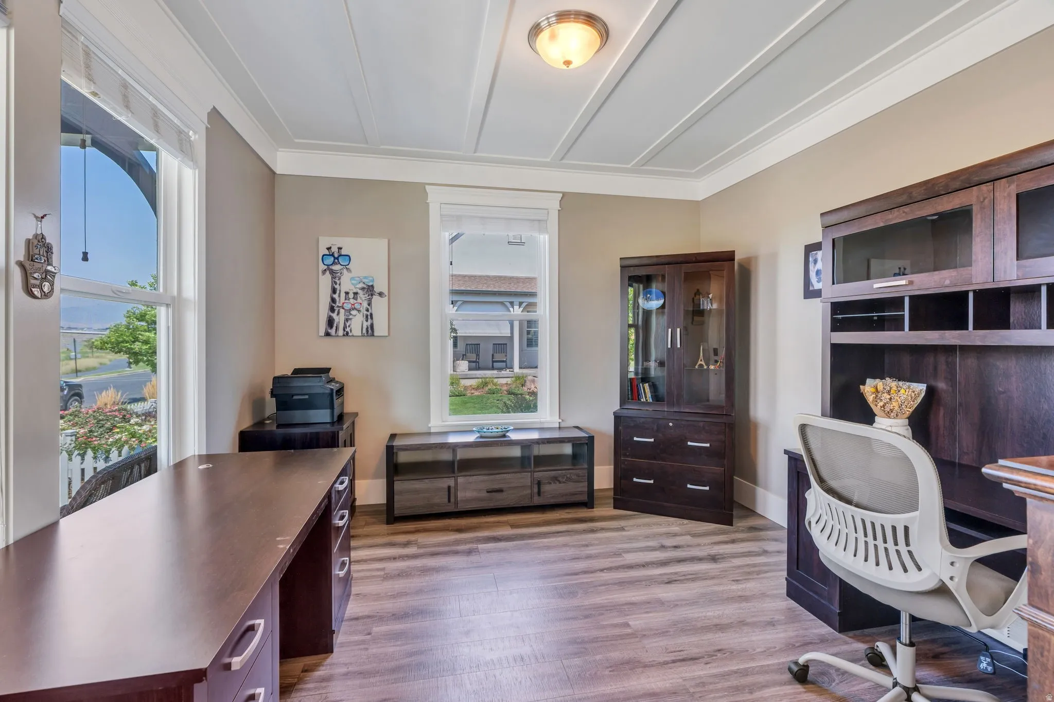 Coffered ceiling, wood-finish flooring, recessed lighting, and multiple windows
