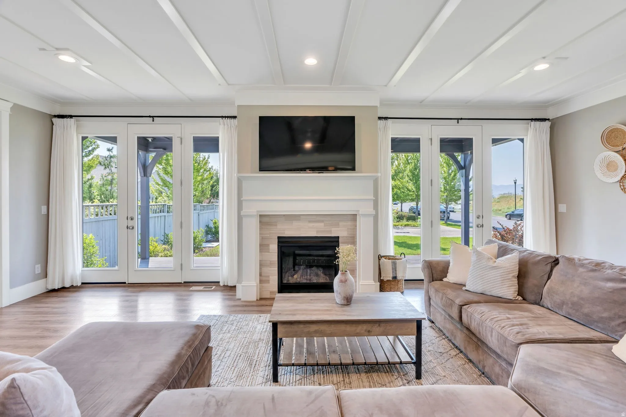 Wood-finish flooring with a decorative area rug