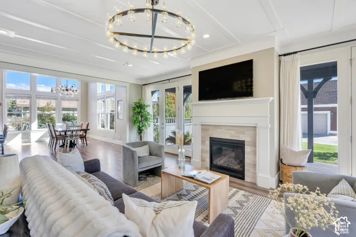 Including a built-in gas log fireplace with custom mantle and access to the side yard via french doors!