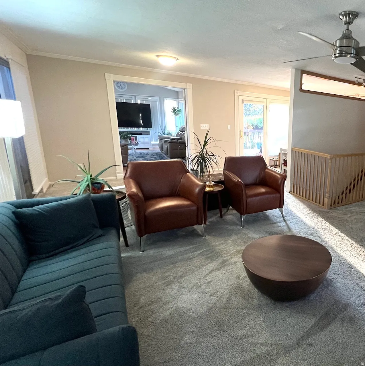 Recessed ceiling lighting, ceiling fan, and carpeted flooring