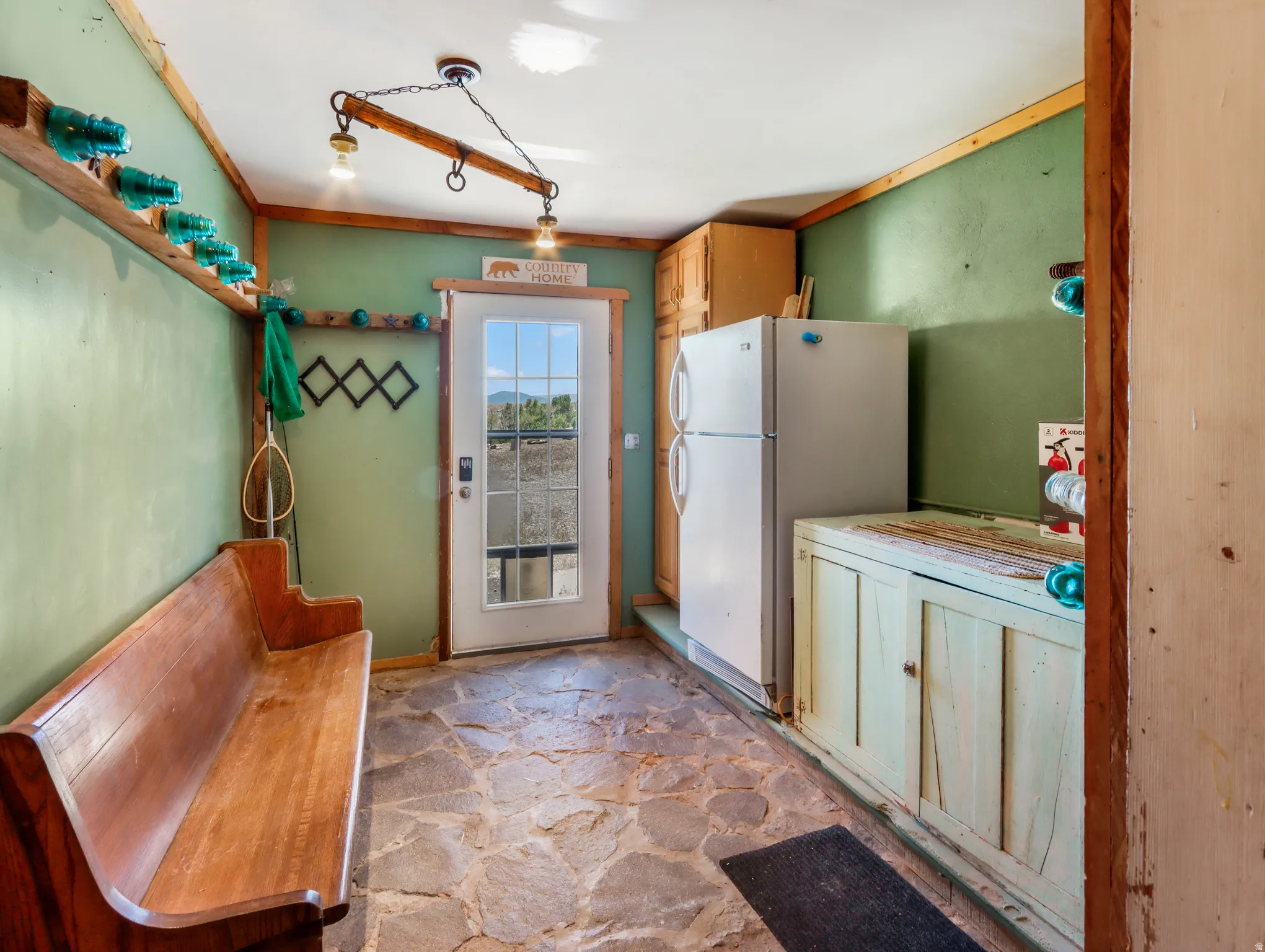 Flagstone flooring with wood trim accents