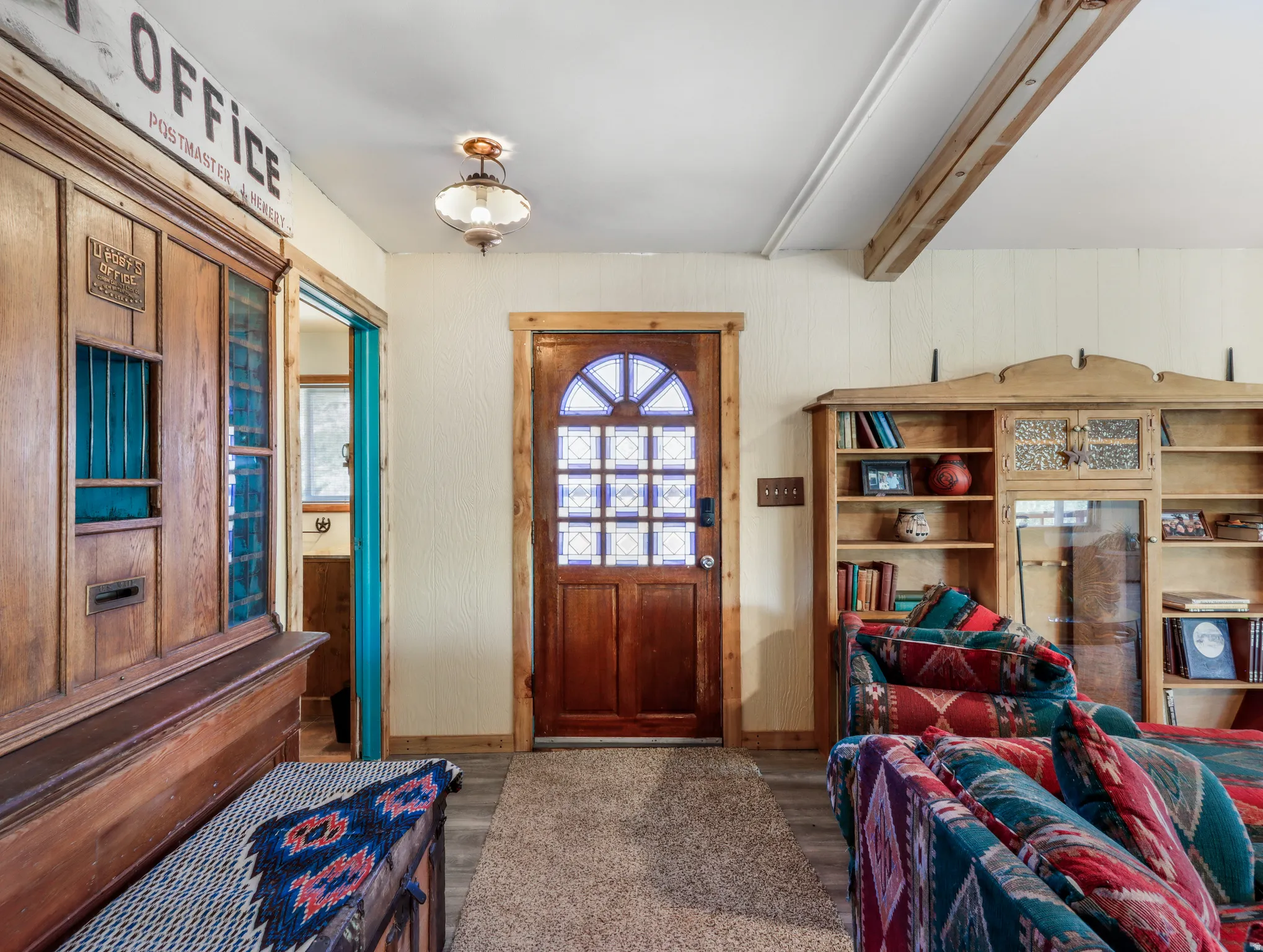 Wood-finish flooring with a carpeted entry