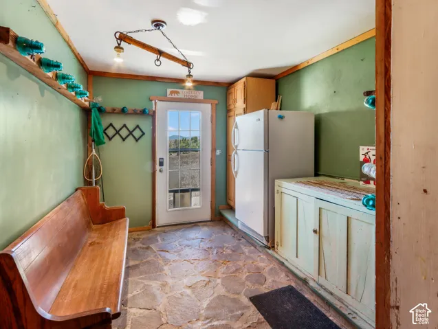 Flagstone flooring with wood trim accents