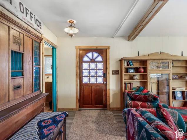 Wood-finish flooring with a carpeted entry