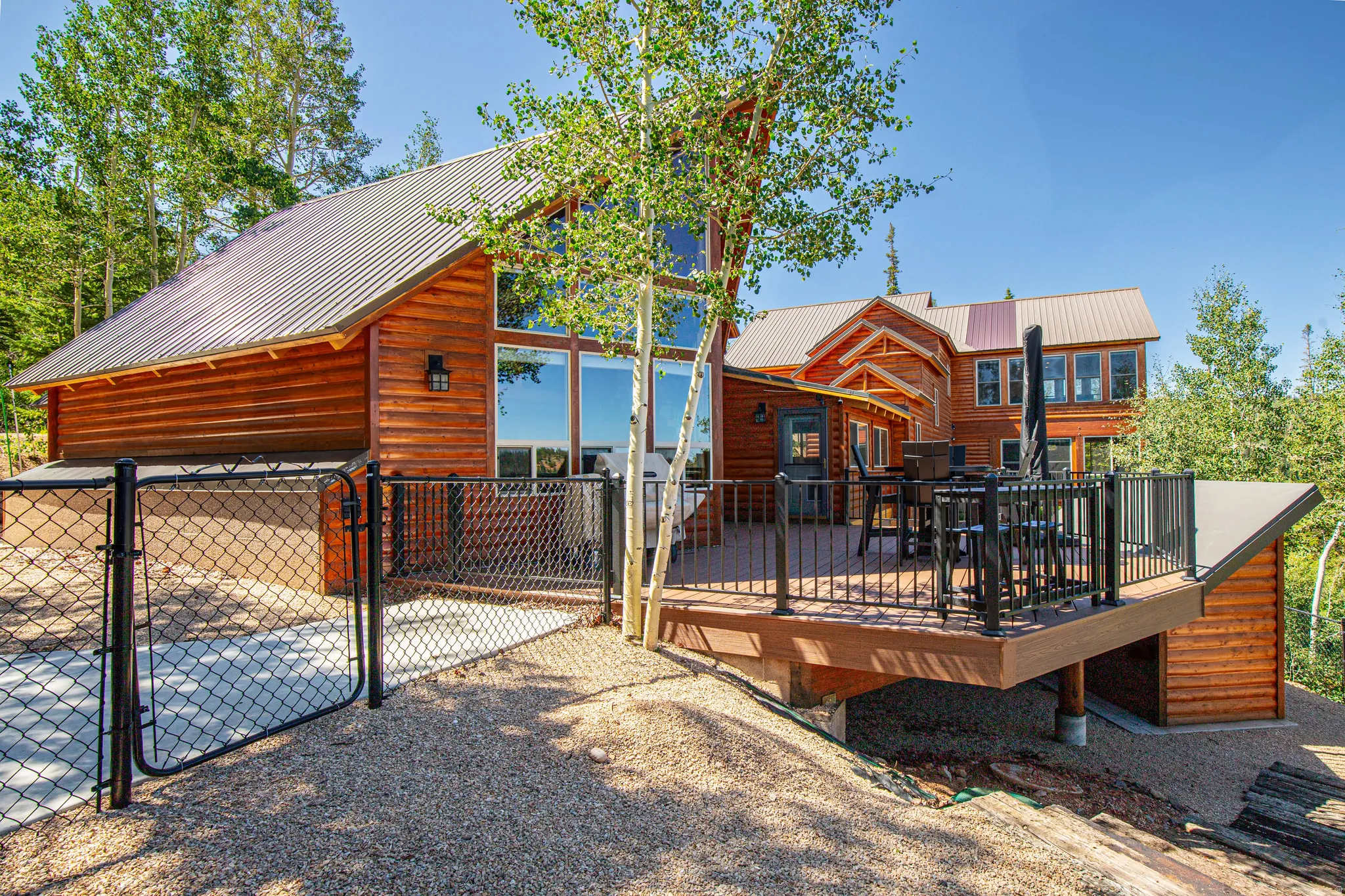 Wood-sided exterior with a metal roof