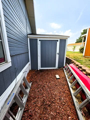 Exterior built-in storage unit, and wood chip ground cover