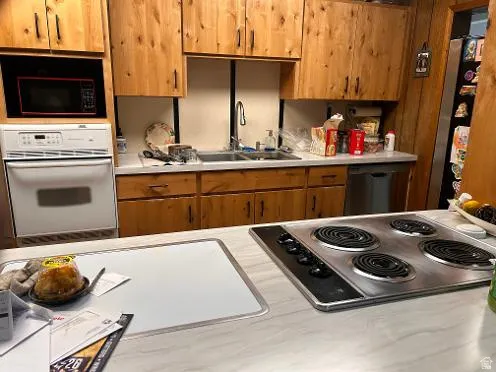 Built-in wall oven and microwave with a countertop range