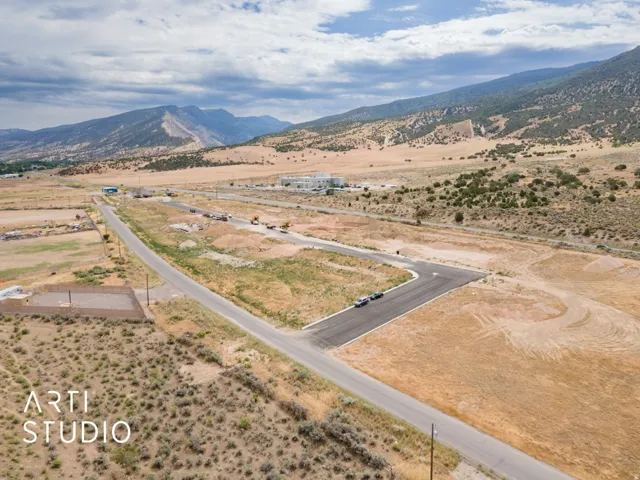 Developing residential lots with paved roads and mountain scenery