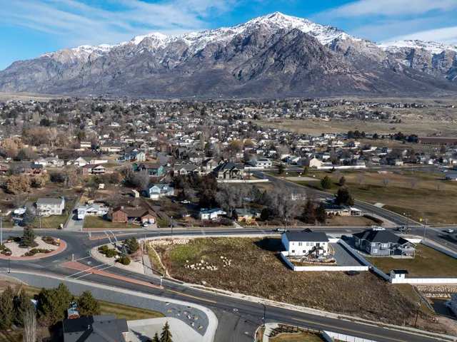 Expansive mountain backdrop with snow-capped peaks