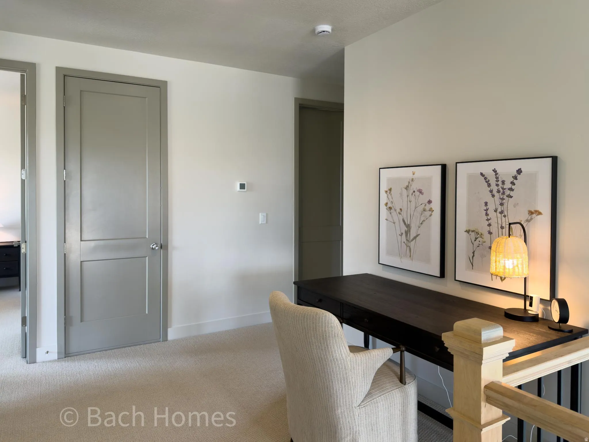 Carpeted flooring, paneled interior doors, and neutral wall tones