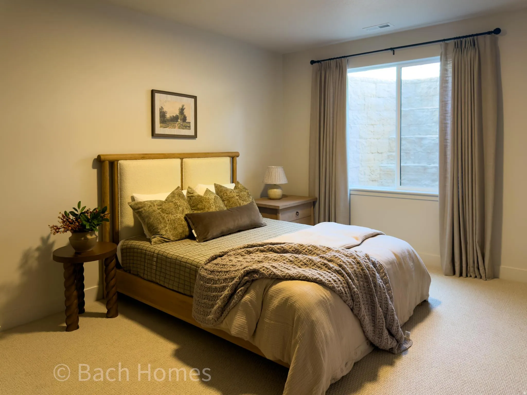 Wall-to-wall carpeting with a neutral finish, a window with a valance and draperies, and recessed lighting