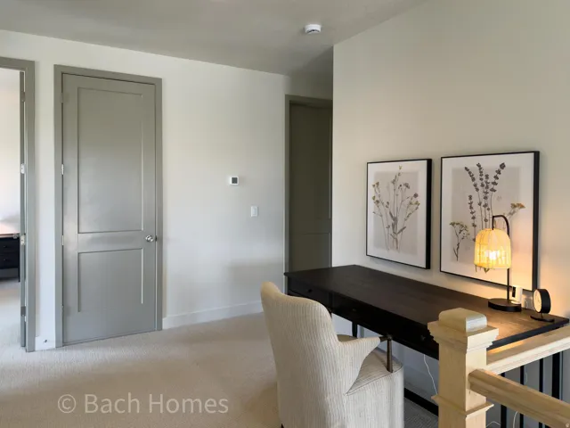 Carpeted flooring, paneled interior doors, and neutral wall tones