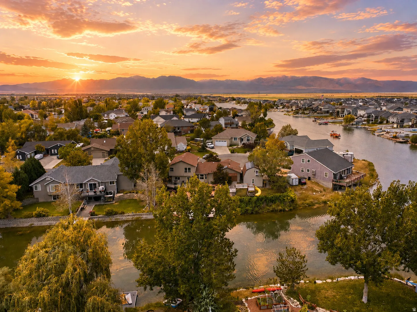 Waterfront community with mountain scenery