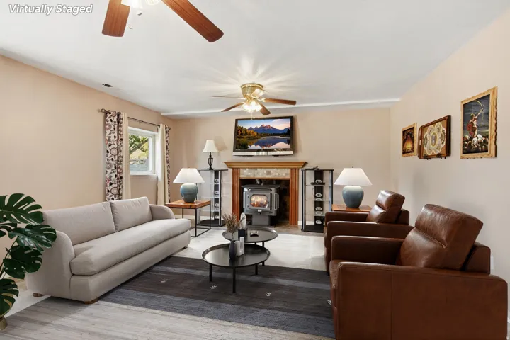 Wood-finish flooring with a decorative area rug