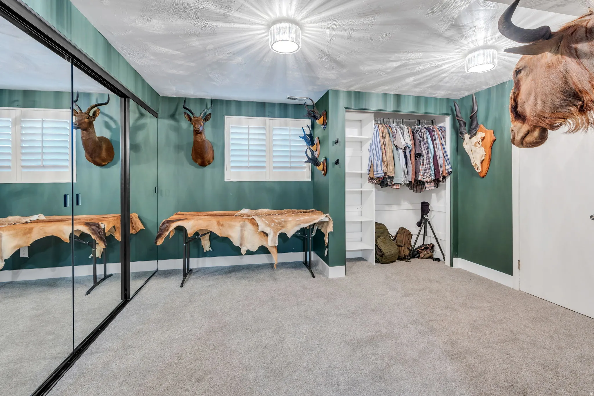 Built-in closet system with open shelving and hanging rods