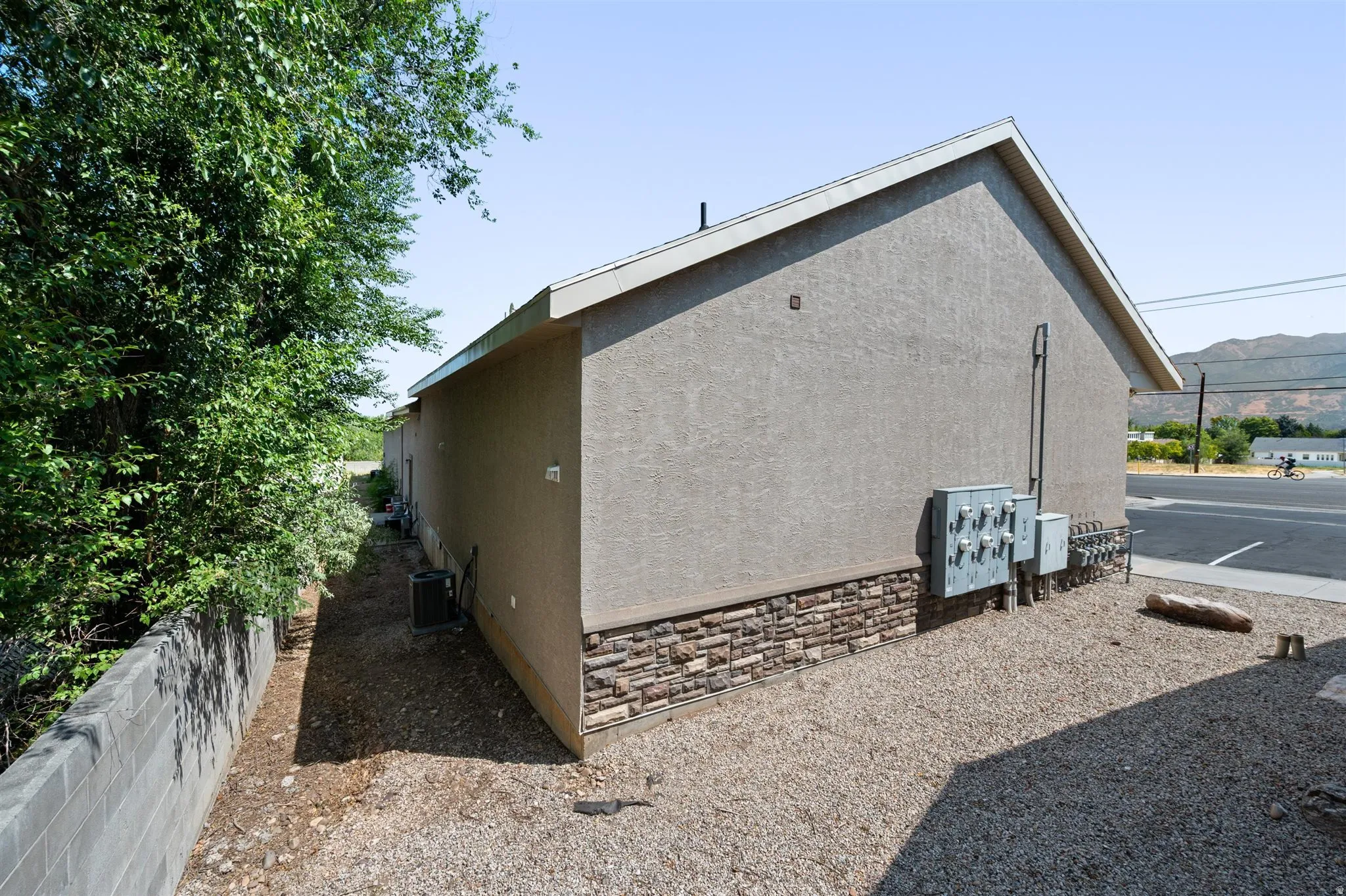 Stucco exterior with stone veneer detailing