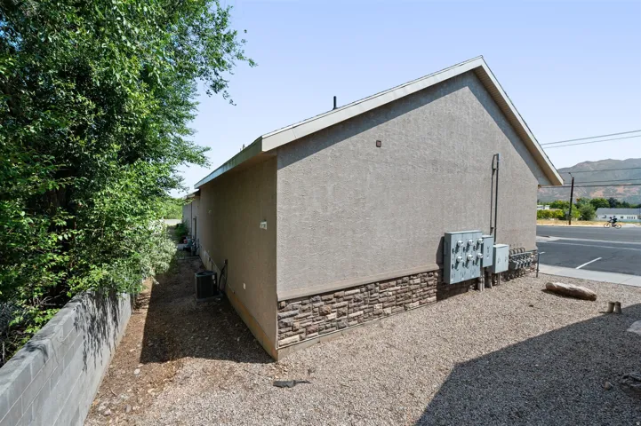 Stucco exterior with stone veneer detailing