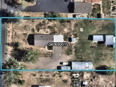 Aerial Property Survey. Cadastral mapping depicting the property boundaries, structures, and site improvements with parcel identification number visible