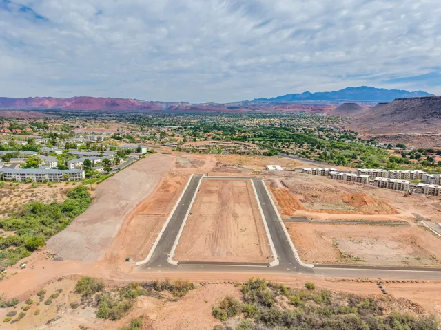 Graded land parcels with paved streets and utility access