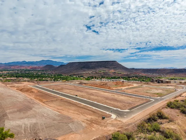 Expansive land development featuring paved roads and utilities