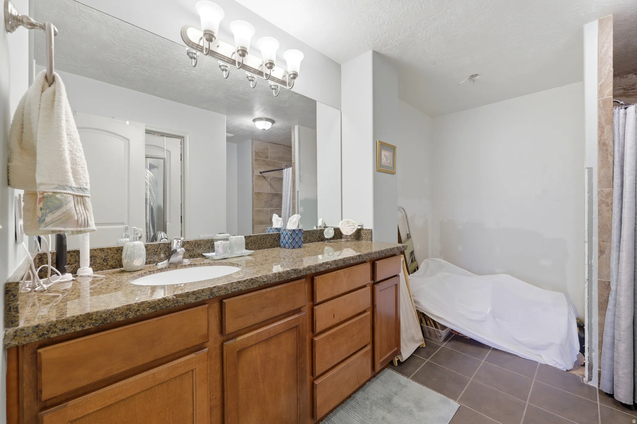 master bedroom bathroom, double vanity, closet space and walk in shower, next photo.