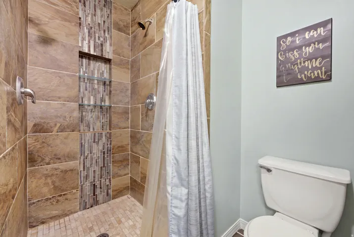 master bedroom bathroom, walk in shower, double vanity and closet space