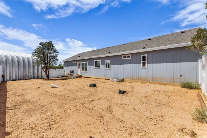 Expansive backyard offering a large, open area