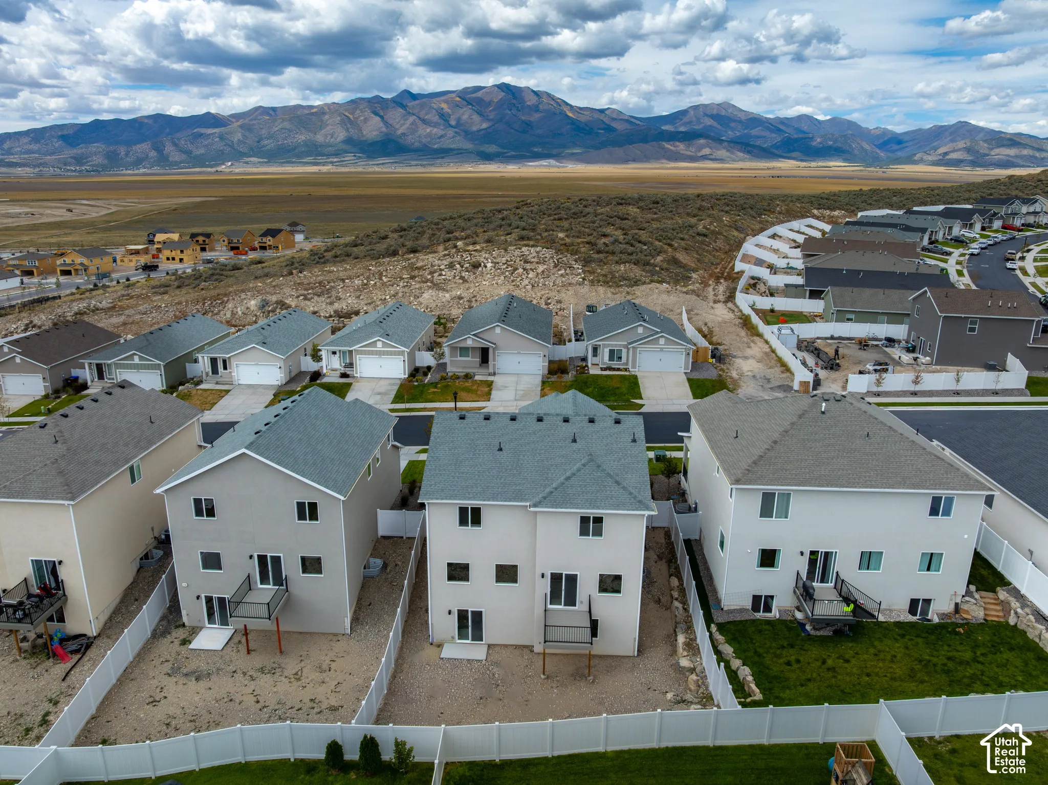 Expansive mountainous landscape framing the community