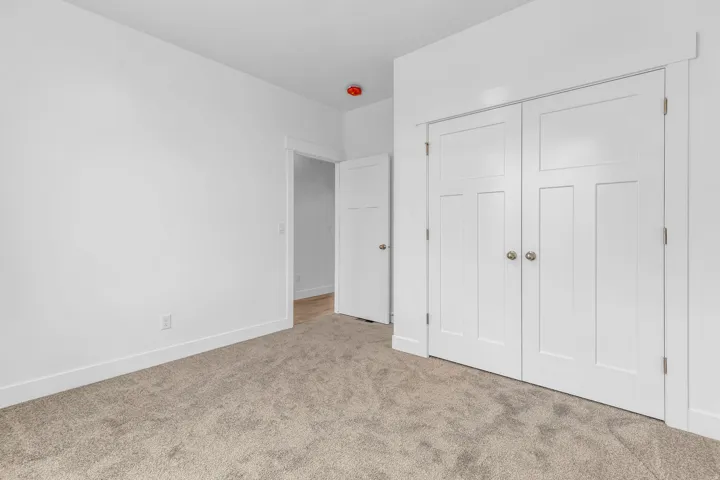 Neutral-toned carpeting throughout