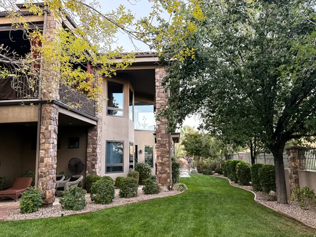 Stone veneer columns and exterior walls define this residence