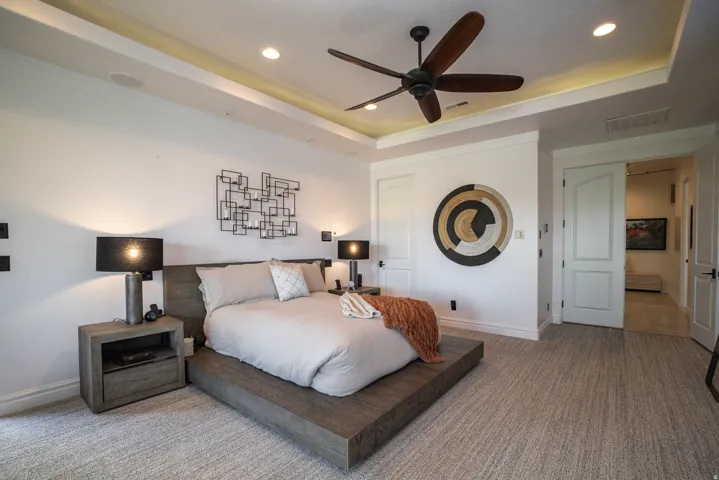Tray ceiling with recessed lighting and crown molding