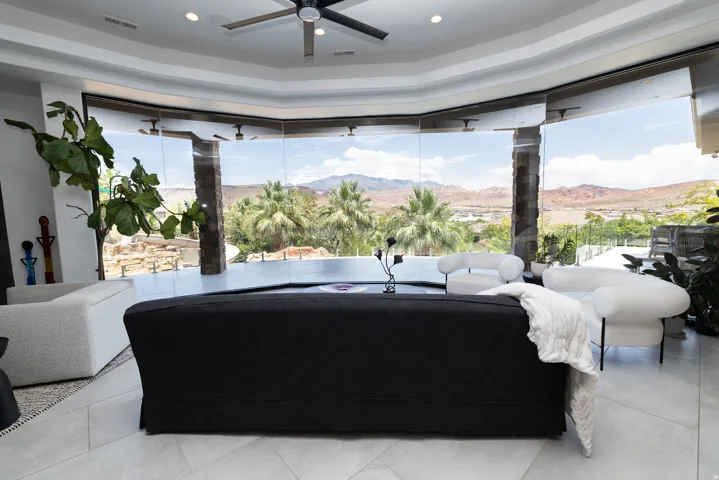 Expansive window wall with mountain backdrop
