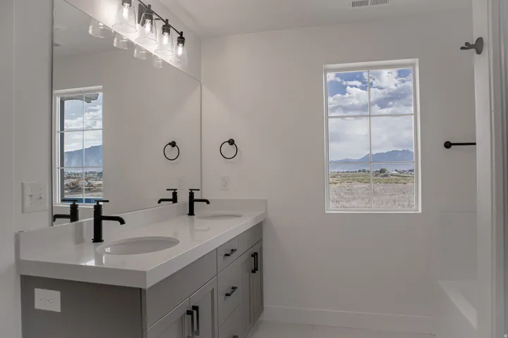 Primary bedroom with dual vanity