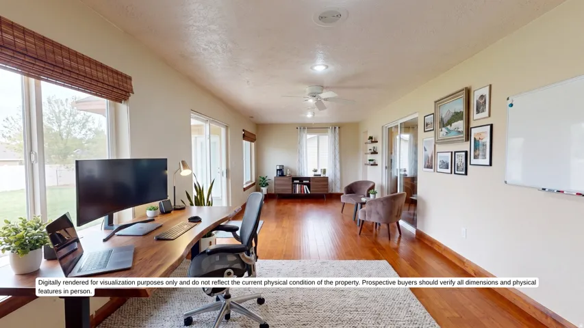 Hardwood flooring, recessed lighting, ceiling fan, expansive windows with natural woven shades, and sliding glass doors