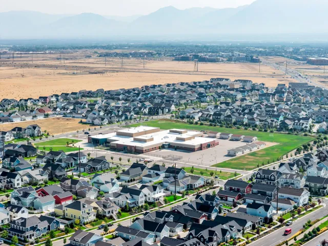 Aerial perspective showcasing a residential development with varied housing styles