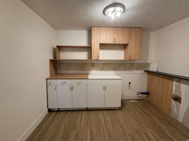 Basement closet/storage/ with rough in plumbing for kitchen