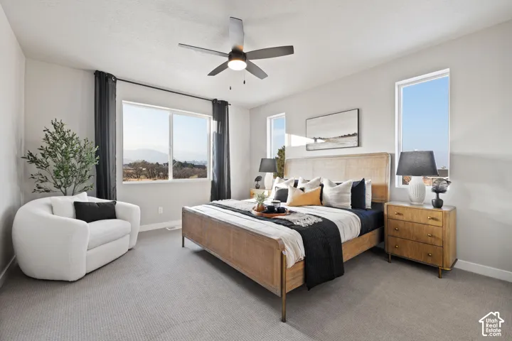 Recessed lighting and ceiling fan, large windows, wall-to-wall carpeting
