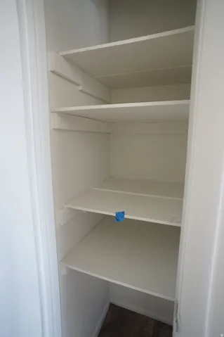 Built-in shelving with multiple white shelves