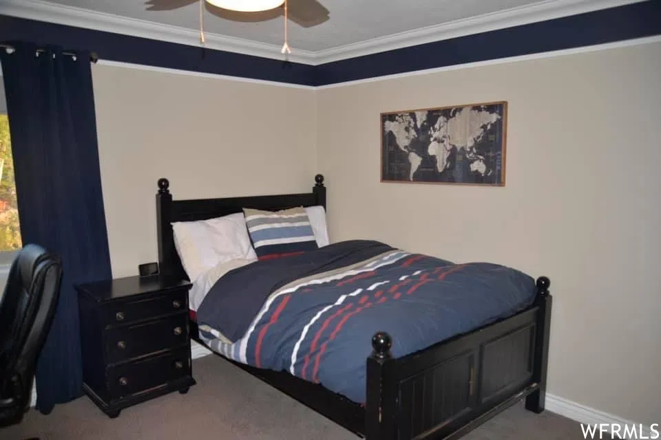 Wall with two-tone paint and crown molding