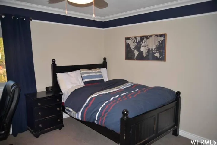 Wall with two-tone paint and crown molding