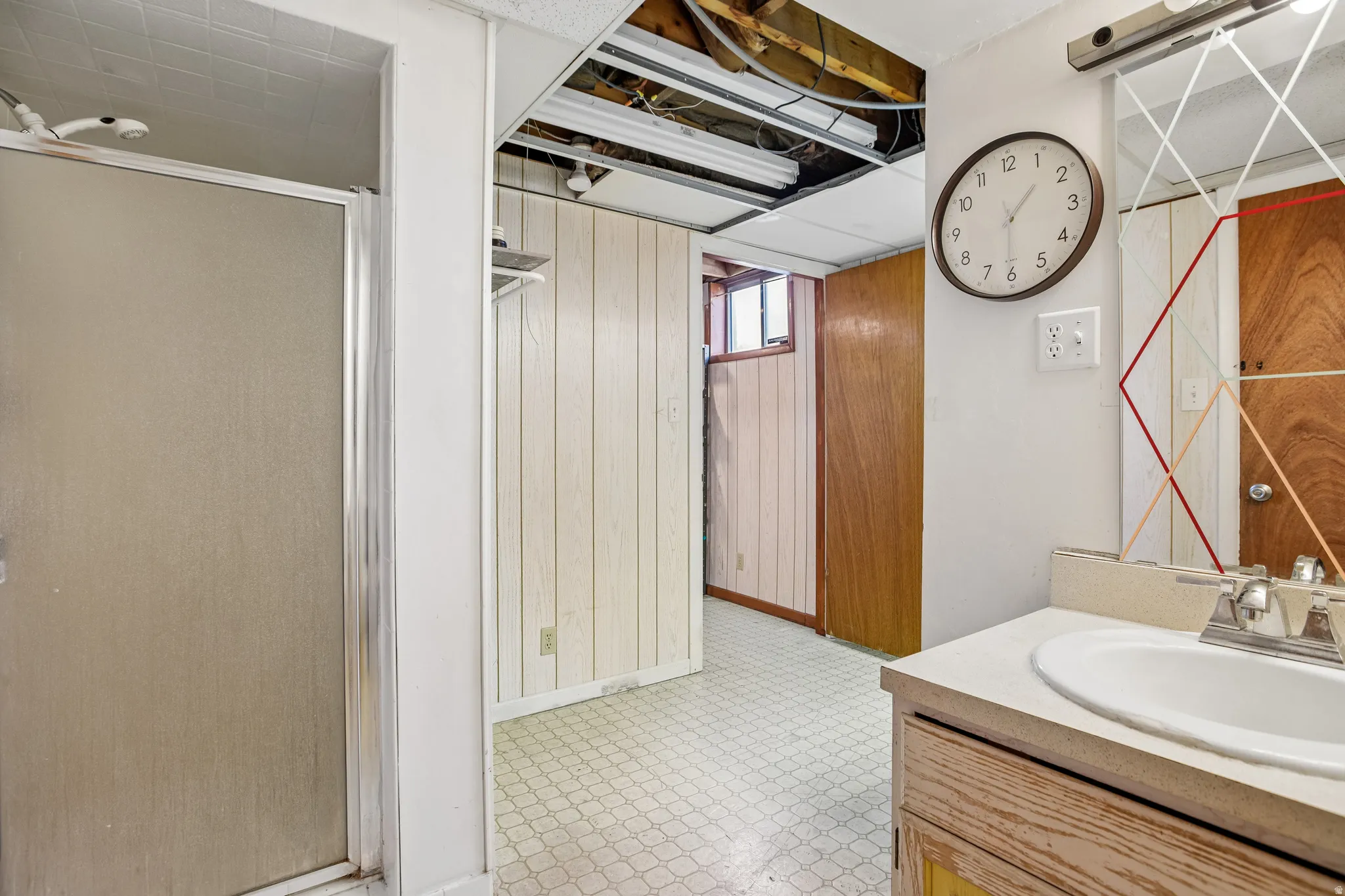 Shower enclosure with frosted glass and chrome trim