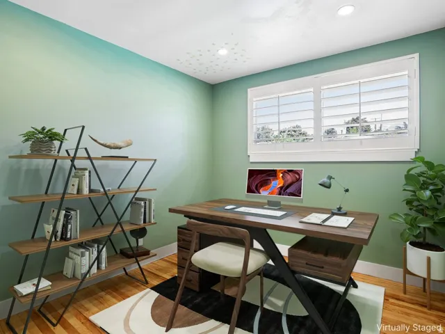 Recessed lighting, wood-finish flooring, and window shutters