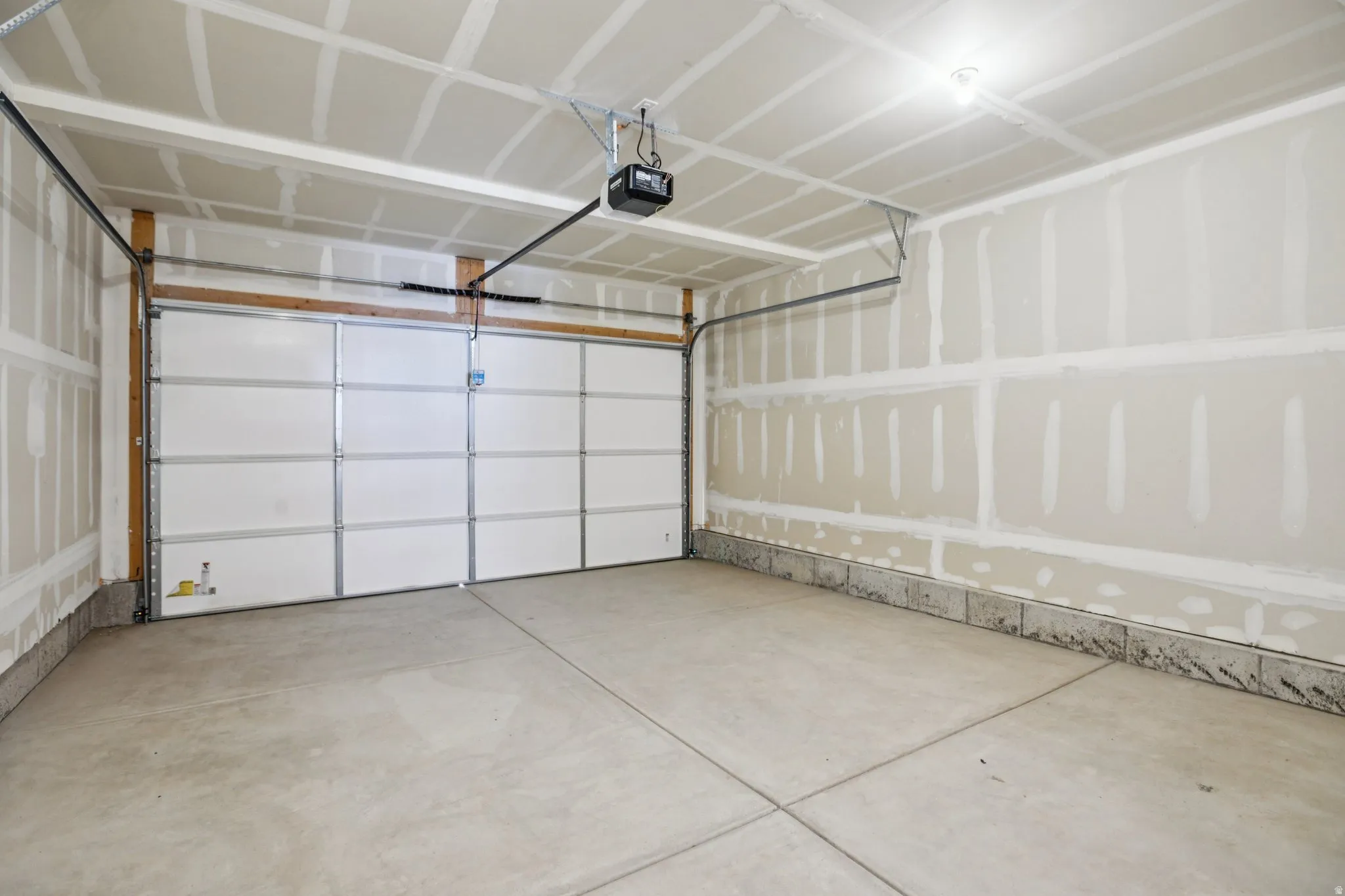 Concrete flooring and unfinished interior walls