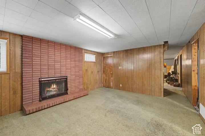 Lower level has a large finished family room with a fireplace that can serve as a 4th bedroom.