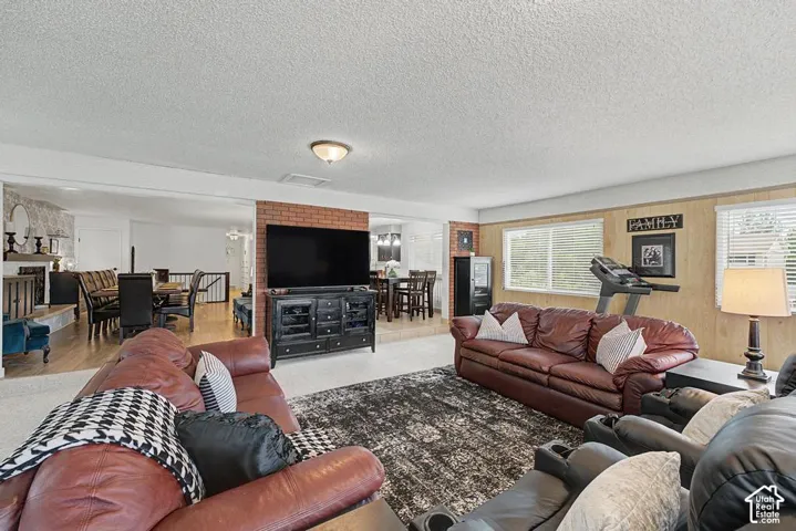 Sun-filled great room is a spacious yet cozy place to relax in.